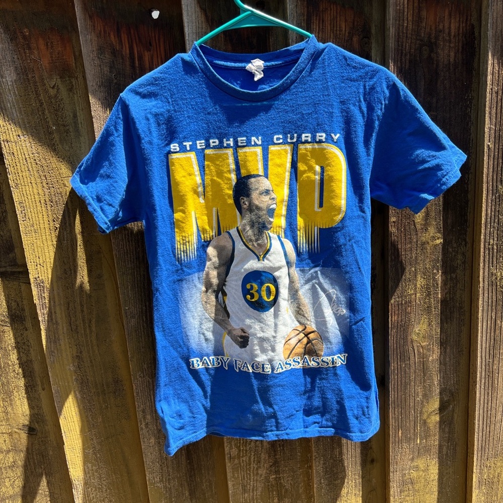 Steph Curry MVP Golden State Warriors shirt.